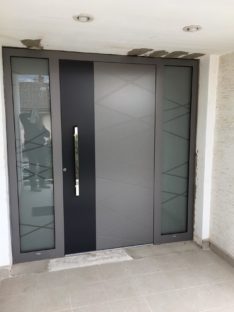 Porte alu gris entrée d'immeuble Alsace